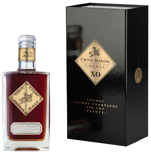 Croix Maron XO Cognac bottle beside its tall black gift box, both featuring the house's diamond-shaped gold emblem.
